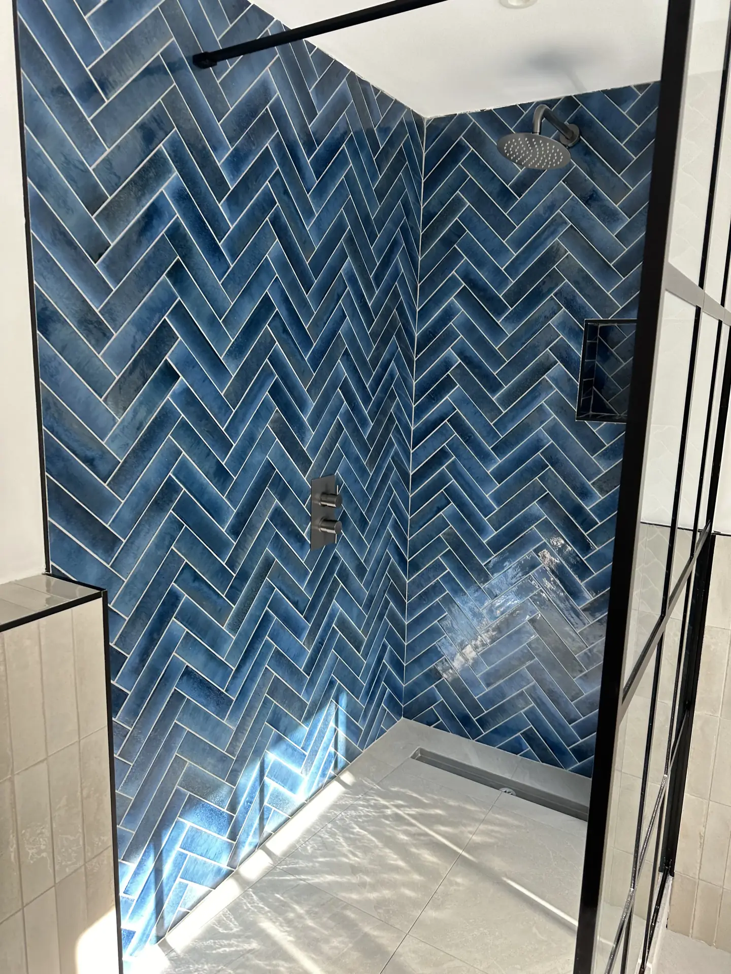 Navy herringbone tiled walk-in shower with Crittall-style screen, son's ensuite, Clapham