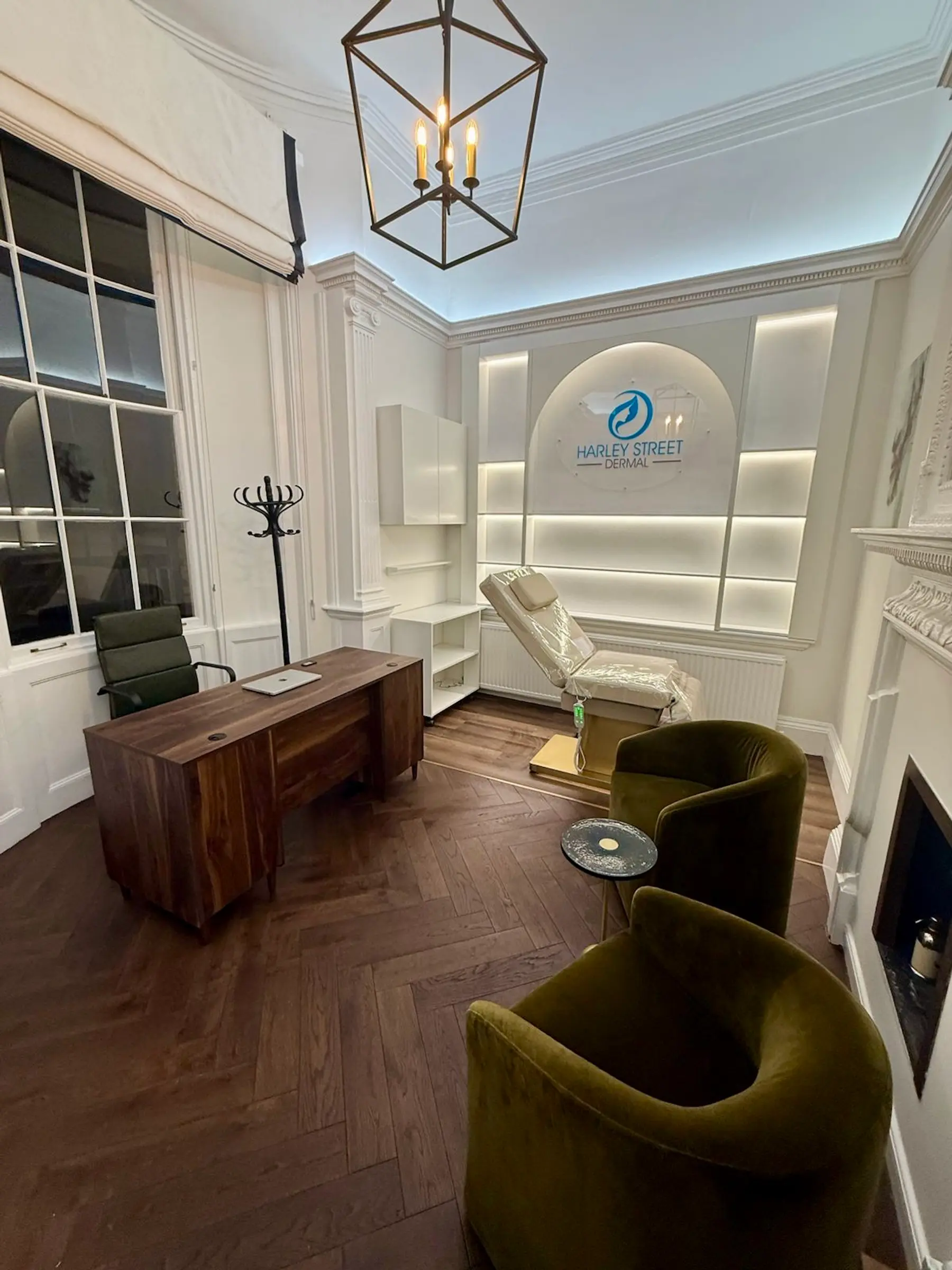 Herringbone oak flooring over retained Georgian floorboards - Harley Street London W1G medical office fit-out