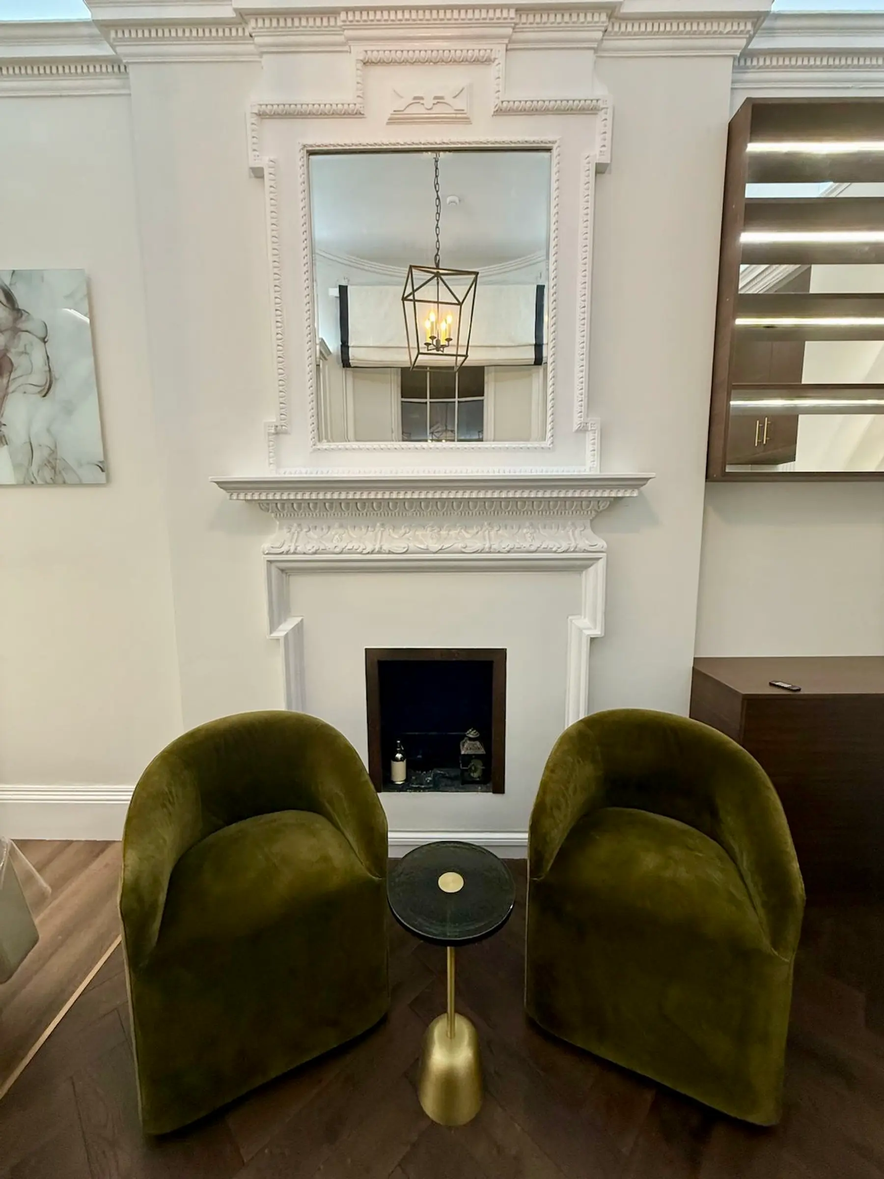 Completed medical office interior with pendant lighting and furniture - Harley Street W1G